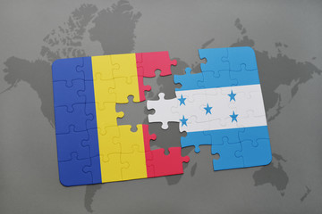 puzzle with the national flag of romania and honduras on a world map