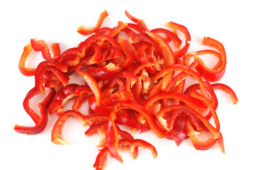 fresh chopped red pepper for salad isolated on white background