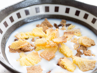 Homemade corn flakes with milk