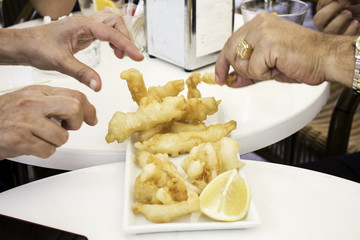 Eating battered squids