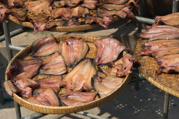 dry out fishes on basket in sunny day