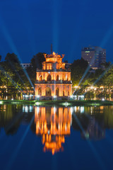 Turtle Tower, the symbol of Vietnam, at twilight period at Hoan Kiem lake (Ho Guom or Sword lake)