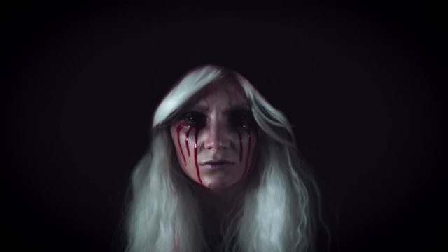 4K Horror Witch with Bloody Tears Appears from Darkness