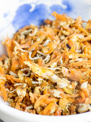 Japanese cuisine, fried shredded carrots, boiled young sardines