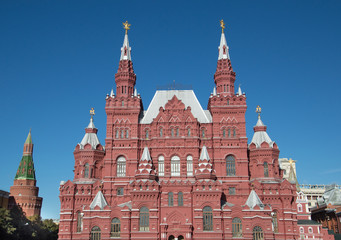 Fototapeta na wymiar State Historical Museum Moscow with its red brick gingerbread house appearance and deep blue sky above. Located on Red Square in Moscow.