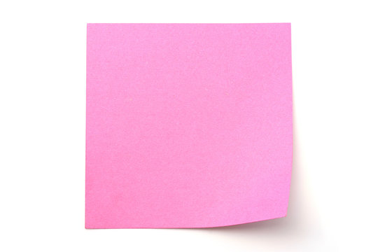 Pink paper stick note on white background
