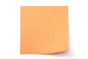 Orange paper stick note on white background