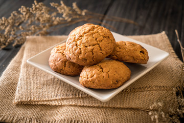 oatmeal raisin cookies on wood