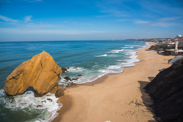 Fototapeta na wymiar Big hole rock at Santa Cruz Azenha beach,Portugal / We can see big hole rock at Azenha beach at Santa Cruz Portugal.