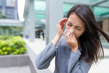 Woman sneeze