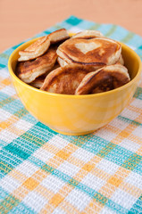 Delicious pancakes for breakfast in yellow plate
