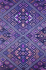  old colorful thai handcraft peruvian style rug surface old vintage torn conservation Made from natural materials Chemical free close up.