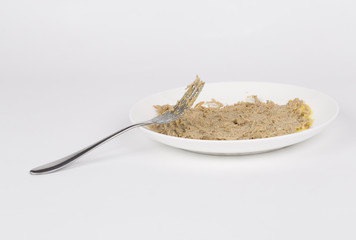 Fresh  Liver pate and fork on the plate.