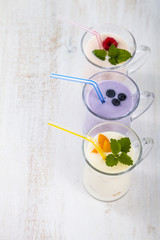 Smoothies or yogurt with fresh berries. Milkshakes with raspberr