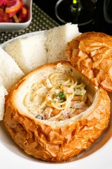 Pasta with Cream Sauce in Bread 