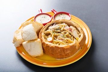 Pasta with Cream Sauce in Bread 