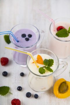 Smoothies or yogurt with fresh berries. Milkshakes with raspberr