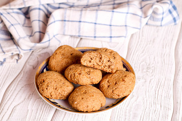 Homemade oatmeal cookie on the wooden table