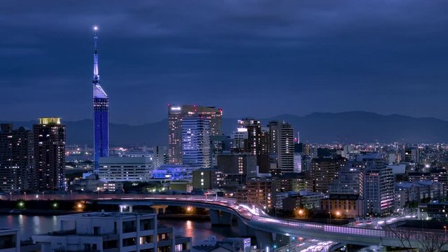 Time-lapse of Fukuoka tower and highway traffic
