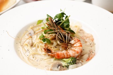shrimp cream pasta on dish