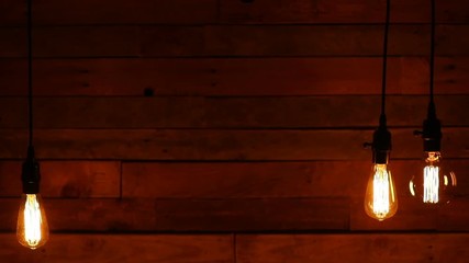 030 This Is A Video Of Old Vintage Hanging Light Bulbs Against Retro Urban Wood Pallet 030 This Is A Video Of Old Vintage Hanging Light Bulbs Against Retro Urban Wood Pallet
