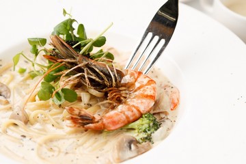 shrimp cream pasta on dish