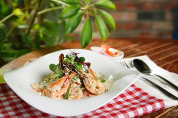 shrimp cream pasta on dish