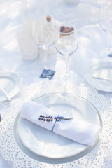 Sprig of lavender on a white plate, table decoration
