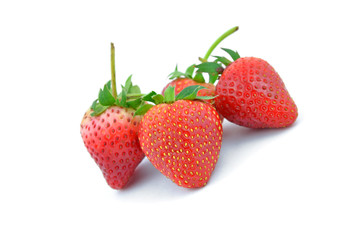 Collection of strawberry fruits of different shaped.
