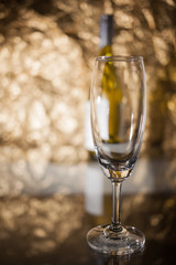 Wine glass on the golden light