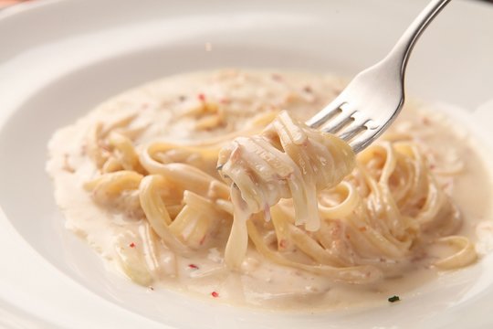 Alfredo Pasta On Table