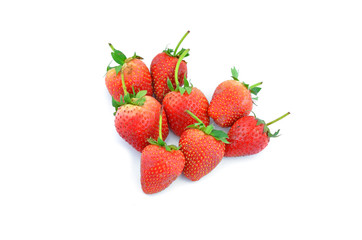 Collection of strawberry fruits of different shaped arranged in