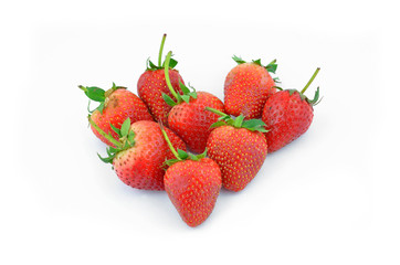 Collection of strawberry fruits of different shaped arranged in