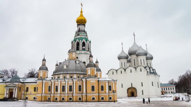 Vologda, Russia time-lapse at sunset. Kremlin square in Vologda, Russia with old church and Saint Sophia Cathedral in winter with snow