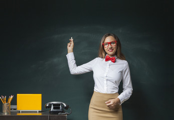 Businesswoman at Blackboard