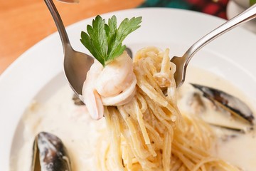 seafood cream pasta on plate