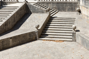 Old sandstone stairs in the park of Templar castle in Tomar, Portugal