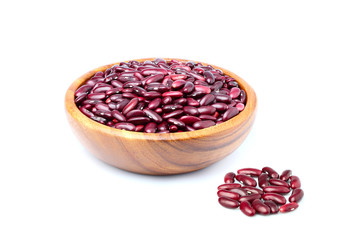 Wooden bowl with haricot red beans isolated.