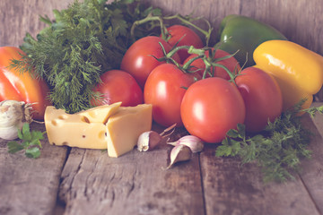 tomatoes, bell pepper, garlic, herbs and cheese