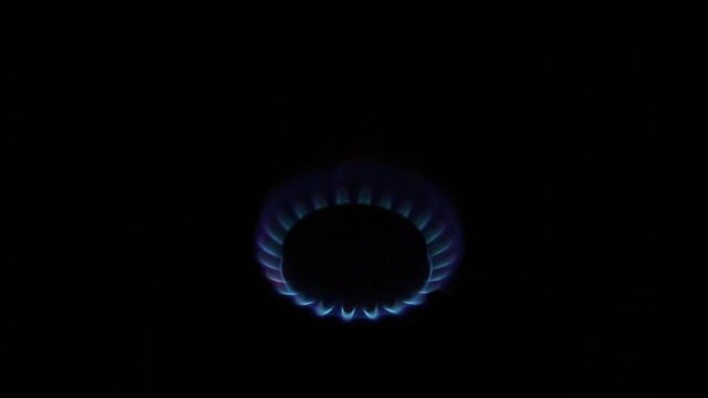 Cooking gas burner on black background