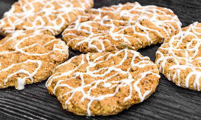 Cookies on the wooden background.