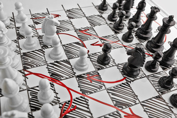 Chess. White board with chess figures on it. Plan of battle. © gedzun