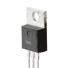 Electronic Voltage Regulator isolated on white background macro