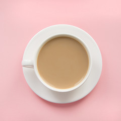 Cup of black coffee with milk on pink background. Isolated. Top view. Square