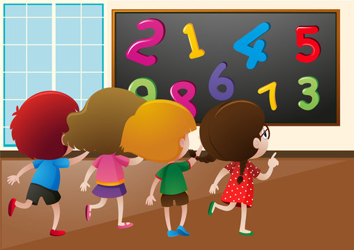 Students counting numbers on the board in class