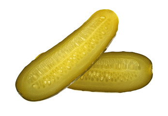 One pickled cucumber cut in half on white background © domnitsky
