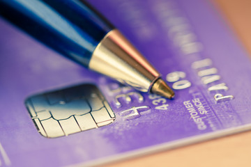 Credit card and pen