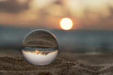 Globe on a beach