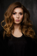 Naklejka premium Beautiful girl in black dress