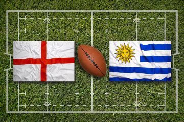 Obraz premium England vs. Uruguay flags on rugby field